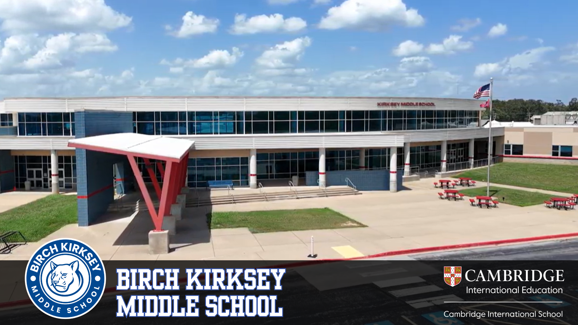 Exterior view of Birch Kirksey Middle School with a modern facade and a flagpole.