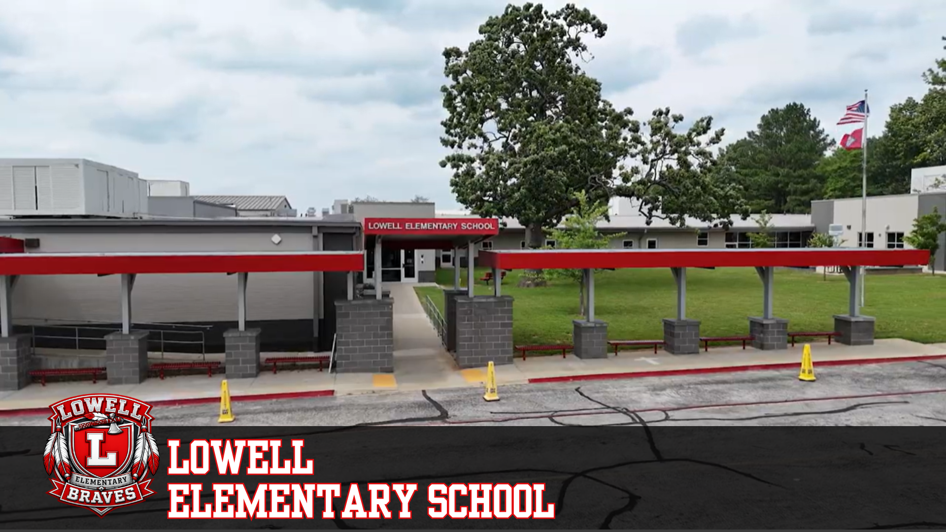 The exterior of Lowell Elementary School with its red and gray facade.
