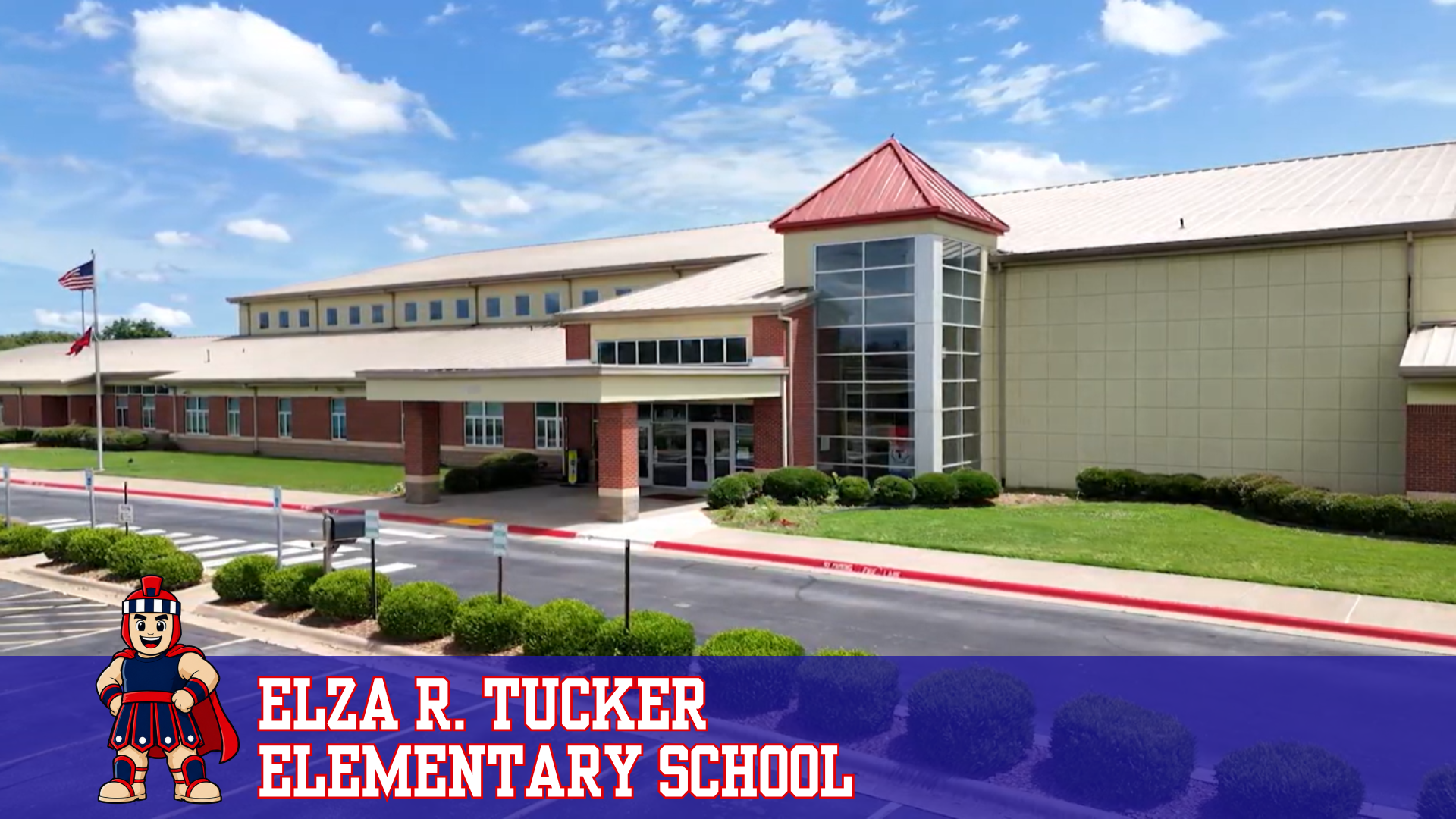Exterior view of Elza R. Tucker Elementary School on a sunny day.