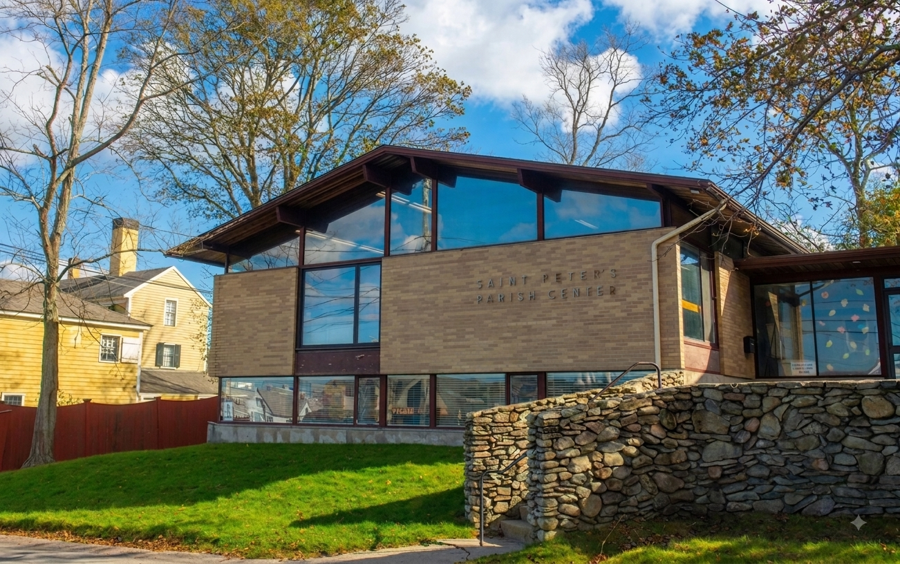A modern brick building with large windows and a sloped roof, labeled 'Community Centre'.
