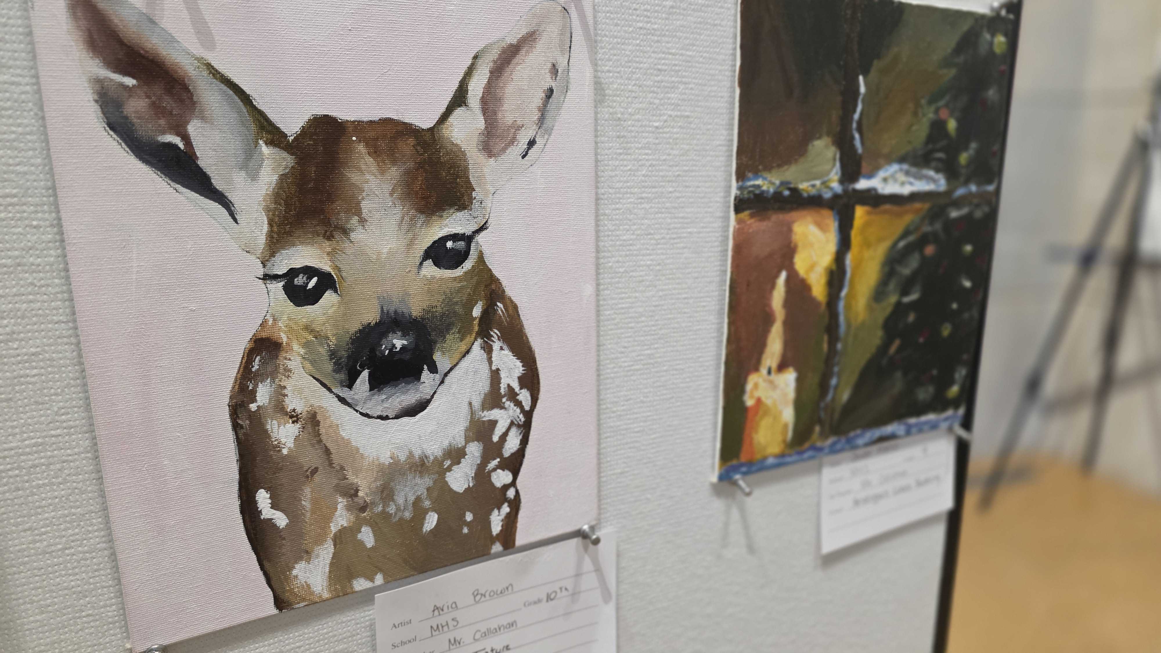 A close-up watercolor painting of a fawn with large, expressive eyes.
