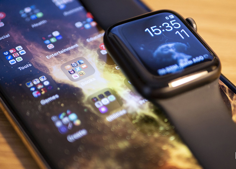 An image of a smart phone and watch