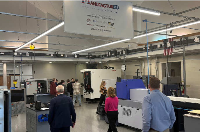 SACS admin visiting CTE facility at another school district