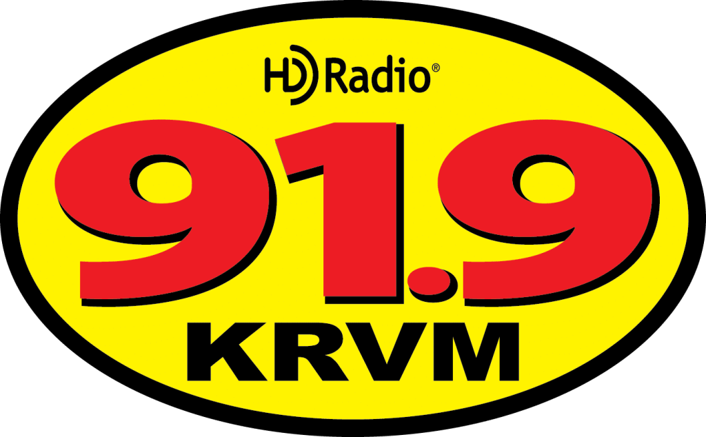 The KRVM 91.9 HD Radio logo features a yellow oval with red text.