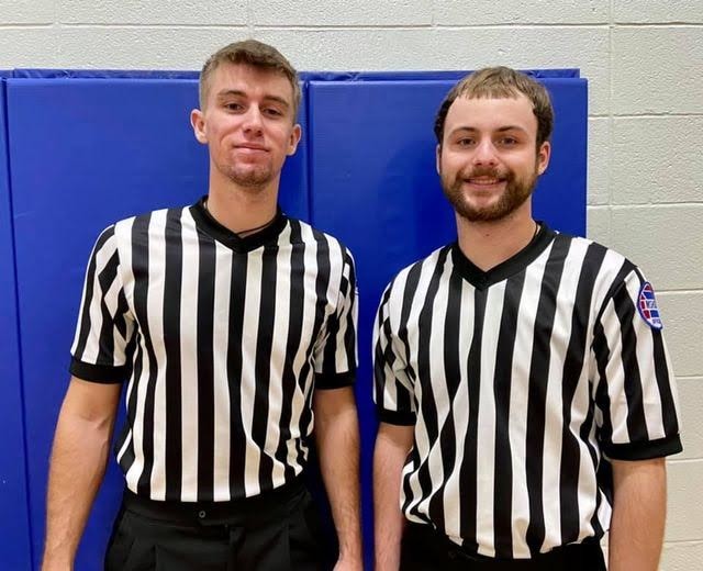 Photo of two refs