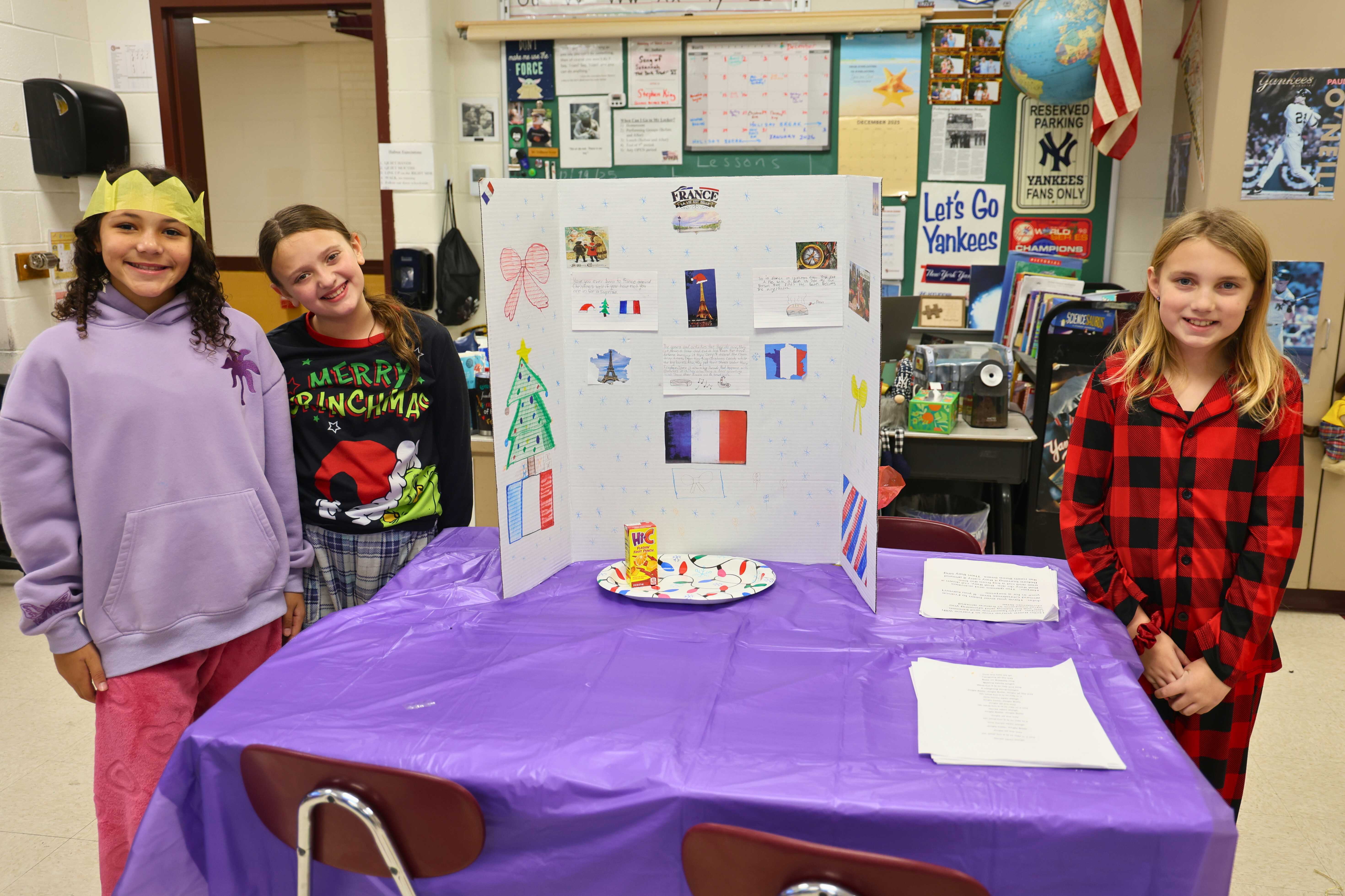 Students in front of their presentation on Christmas in France