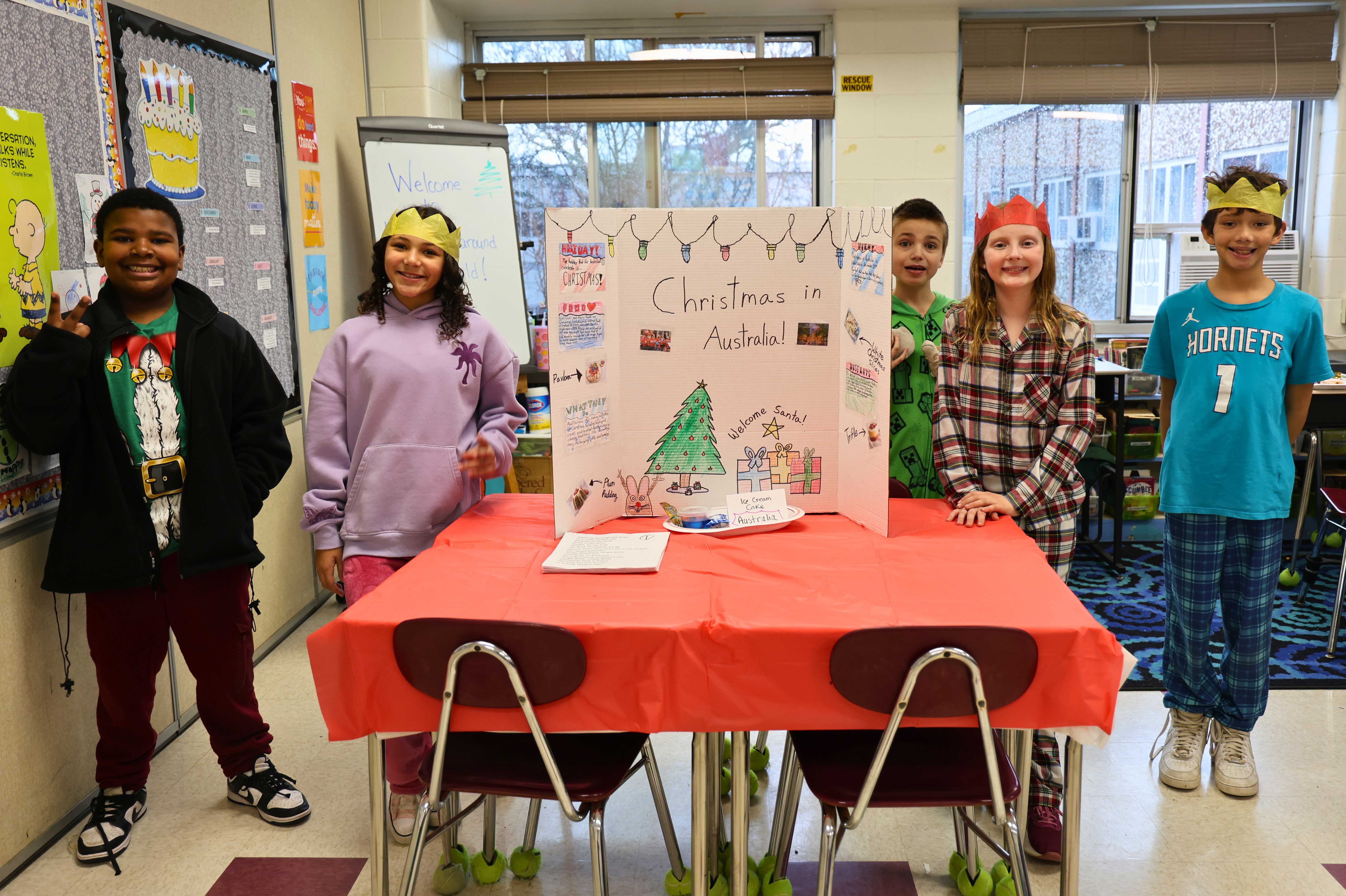 Students in front of their presentation on Christmas in Australia
