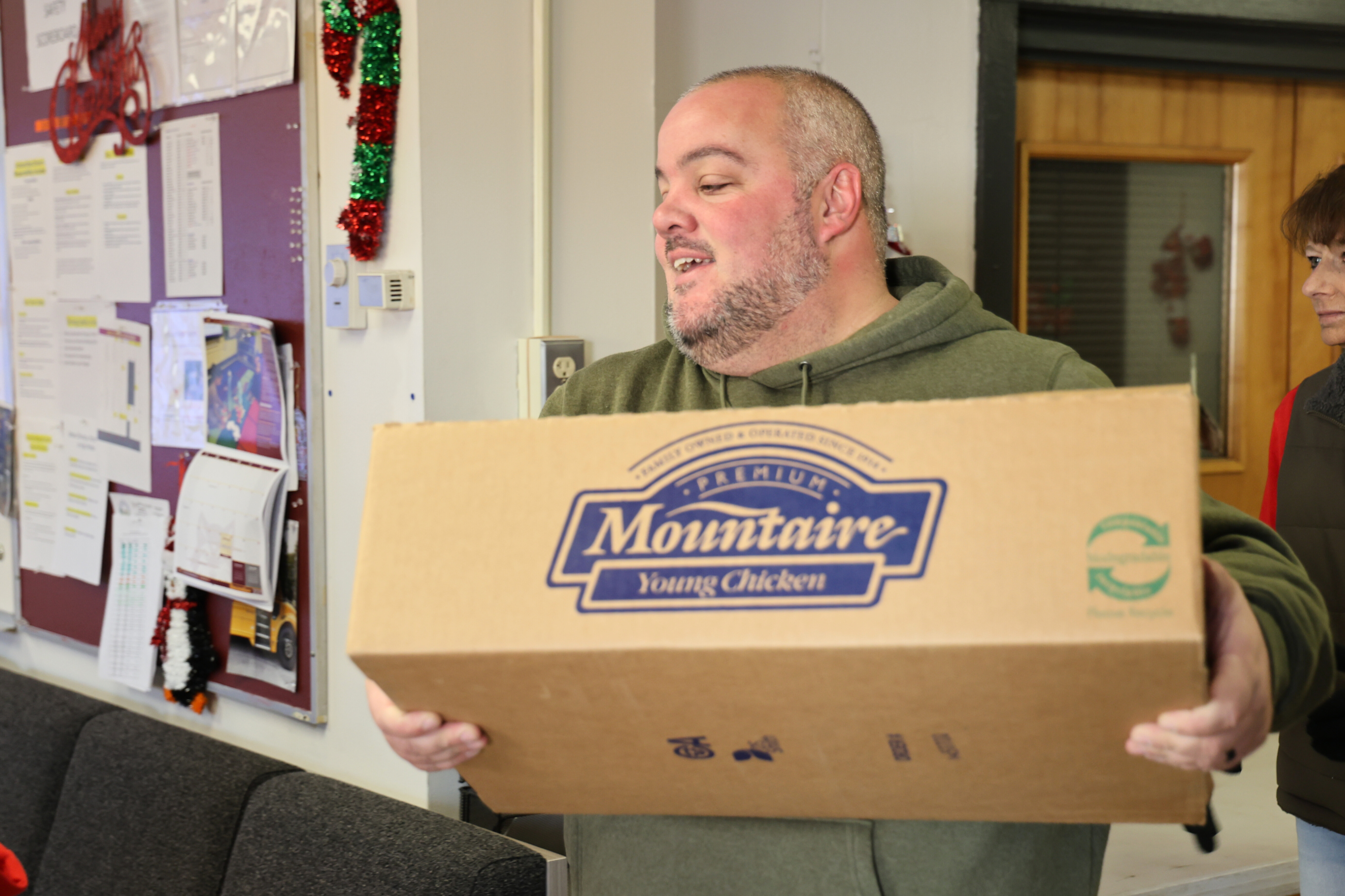 Transportation Supervisor Brian Sim with donated food