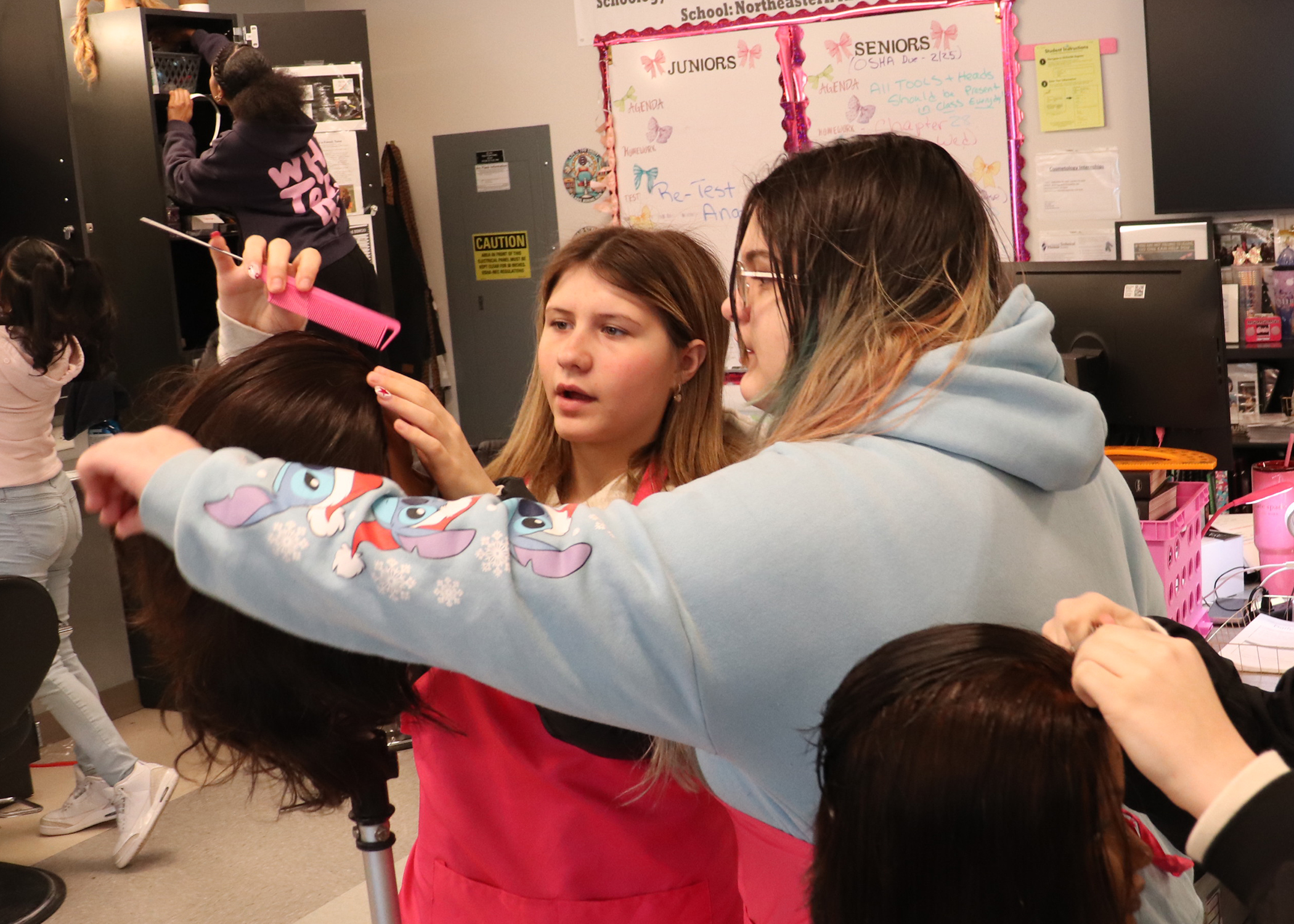 Student learns about hair styling at BOCES CTE