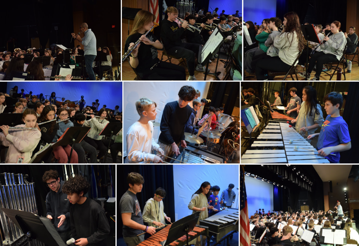 A school band performs on stage, with musicians playing various instruments.