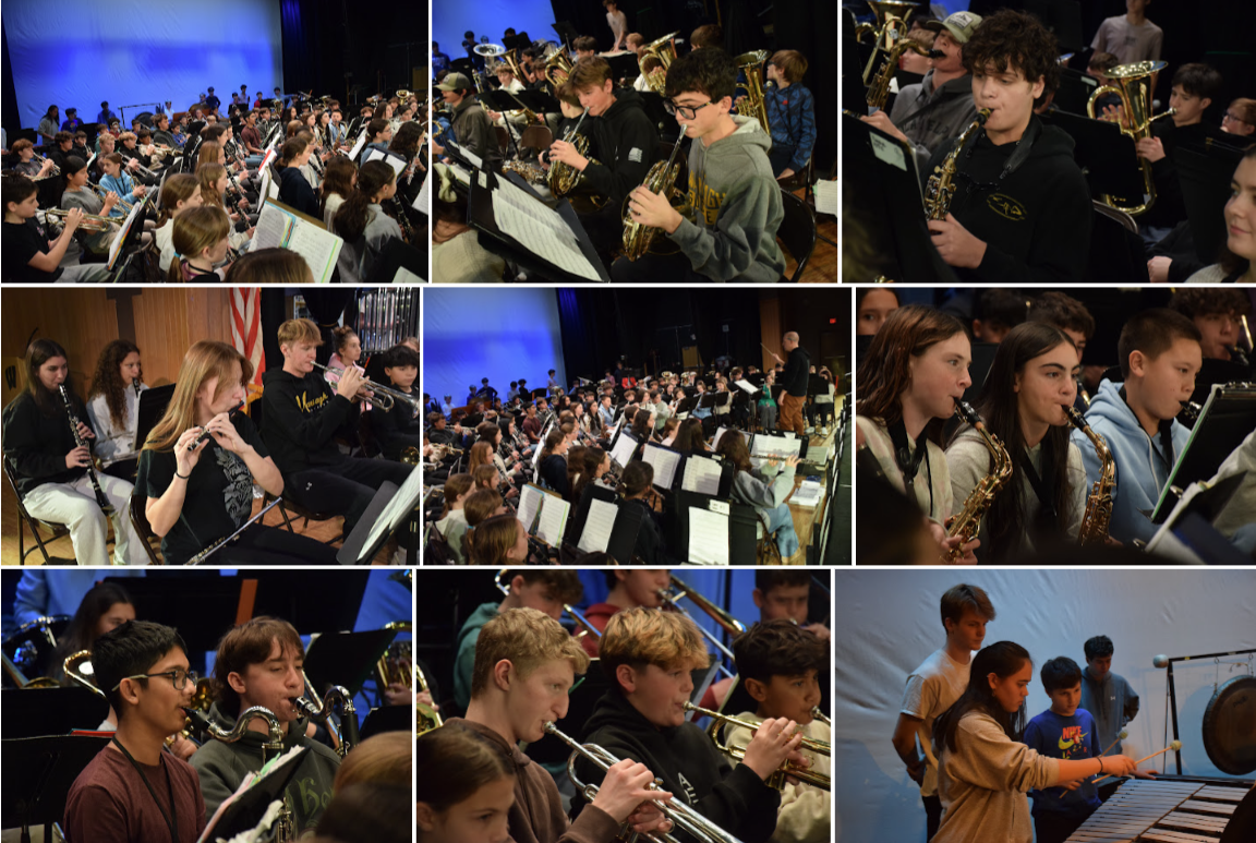 A school band performs on stage, with musicians playing various instruments.