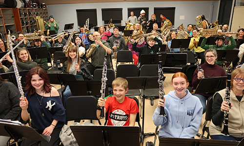 Members of the Penfield Family Band at rehearsal.