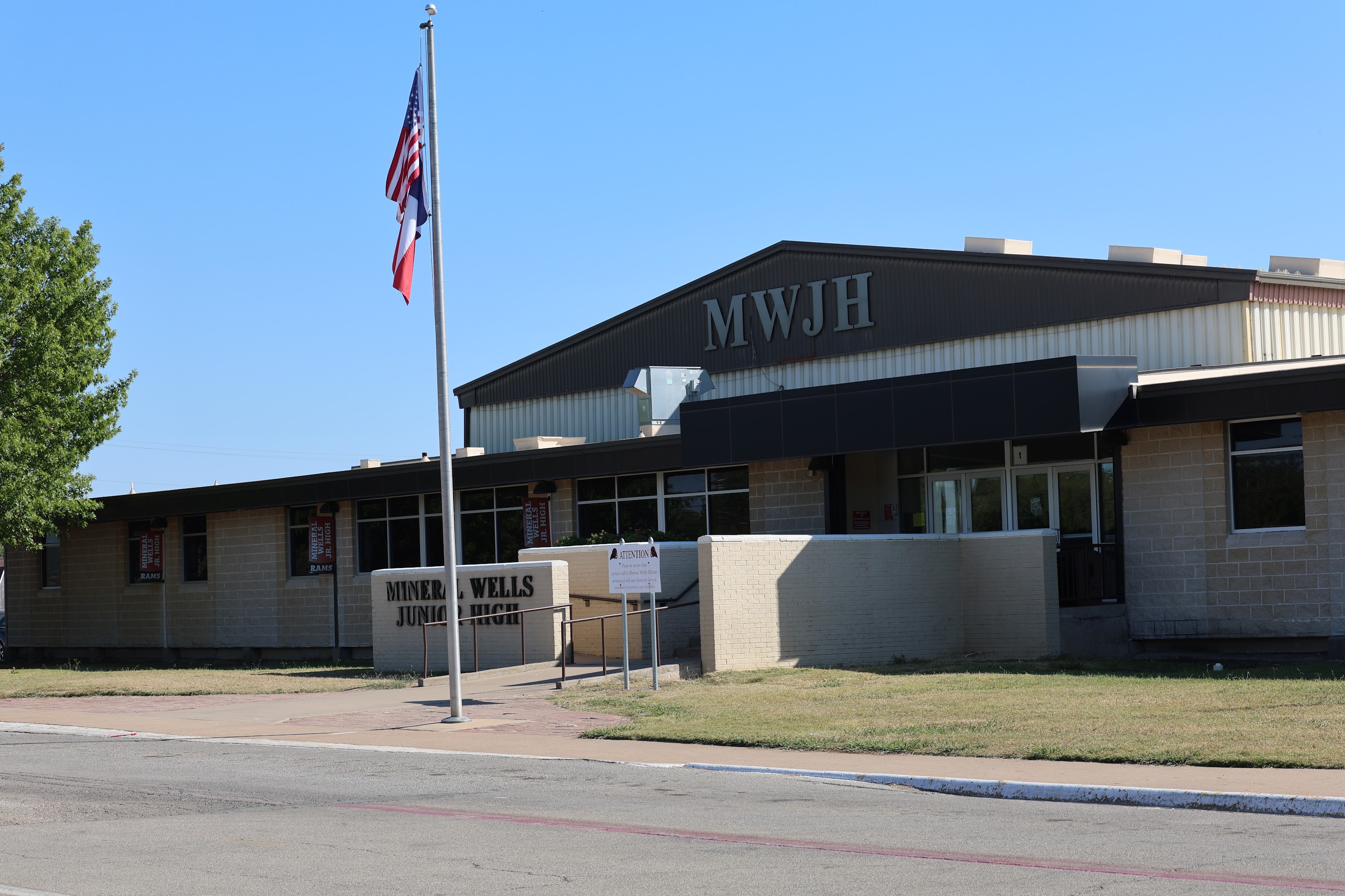 The exterior of Mineral Wells Junior High School on a sunny day.
