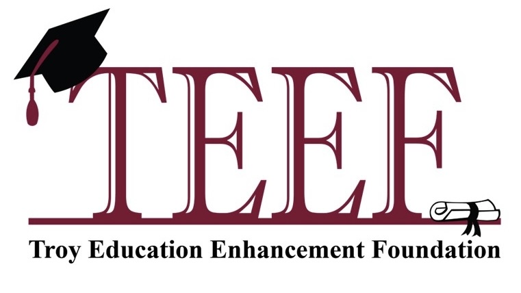 Logo for the Troy Education Enhancement Foundation featuring large red letters spelling TEEF.