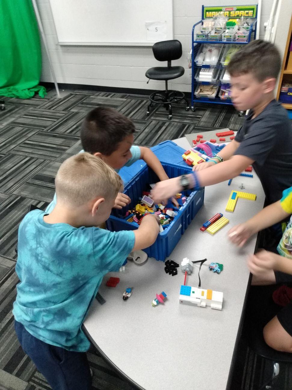 Children playing with Legos together