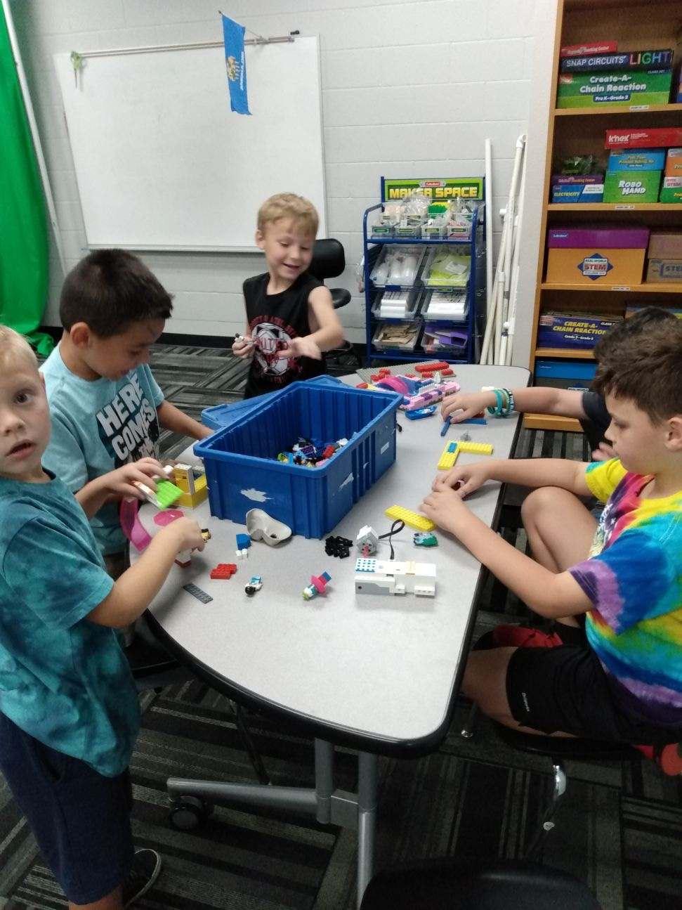 Children playing with Legos together