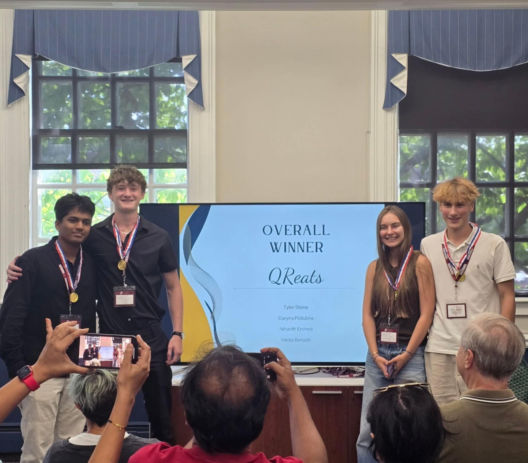 MHS Senior pictured with three teammates at a Harvard Entrepreneurship event,