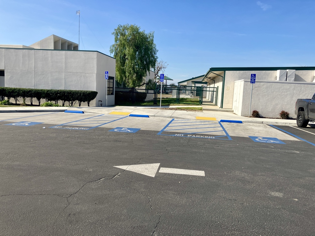 This is a picture of the 3 handicapped spots by the Wingland Office