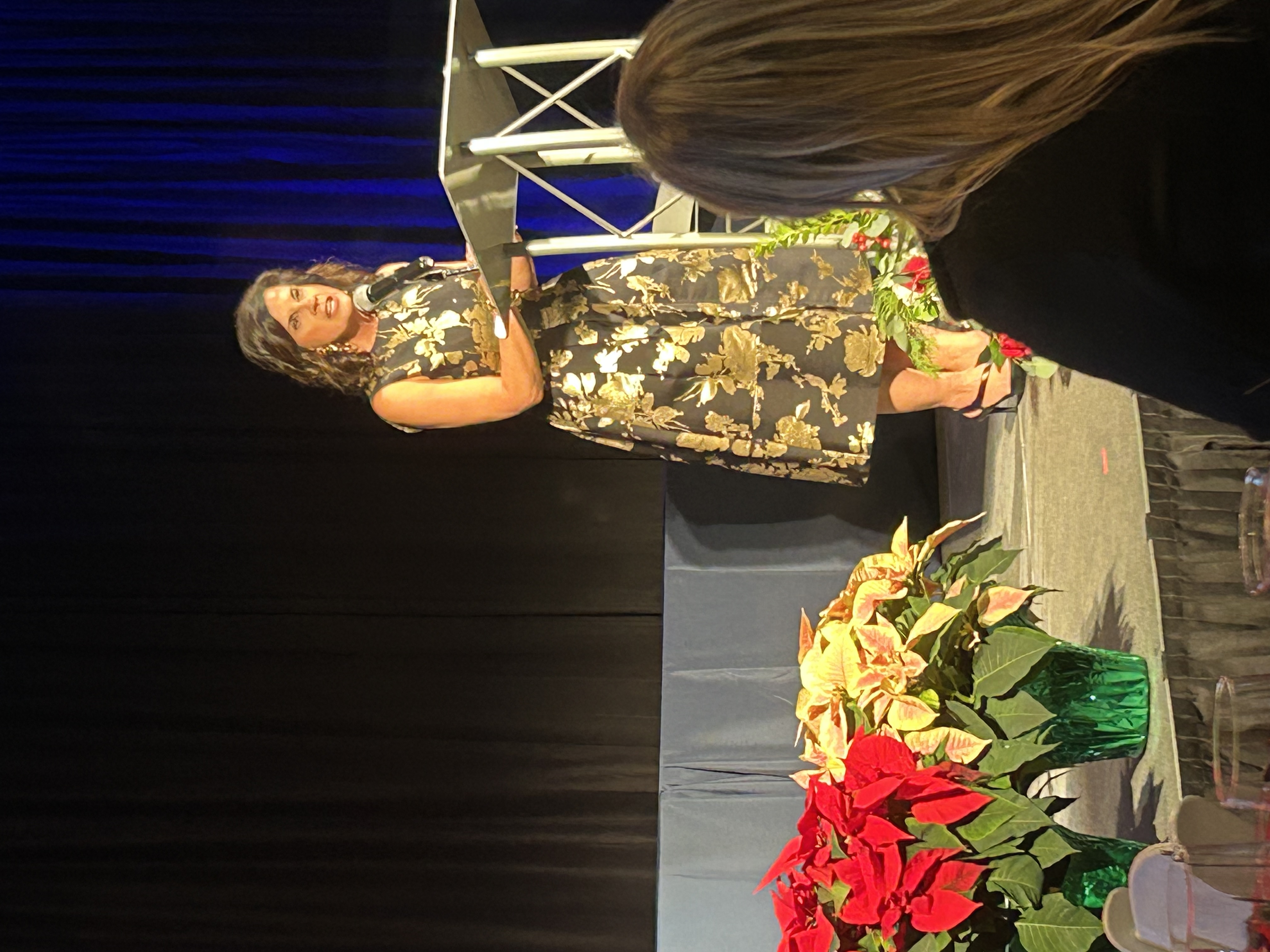 Dr. Diana Wood accepts the Supervisor of the Year award