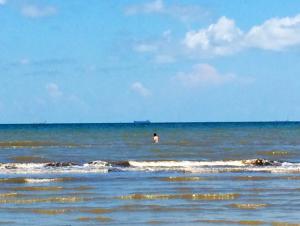 Swimmer wading out - Galveston