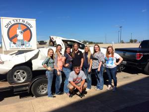 Jeanne Brown, Alex's mom, pictured with some of GHS StuCo members.