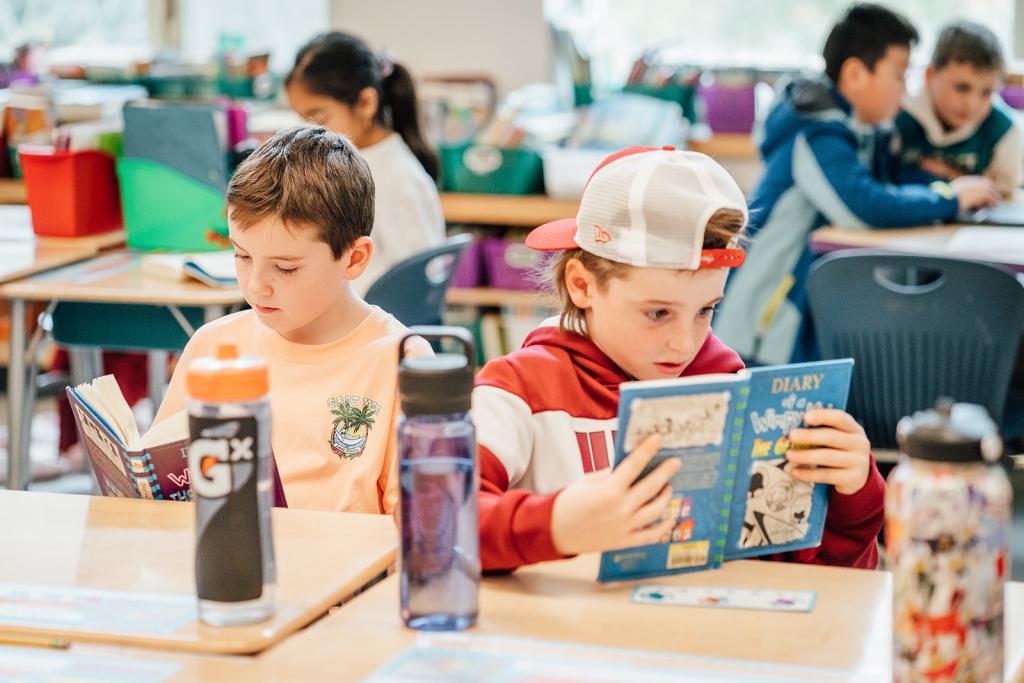 VO students reading books