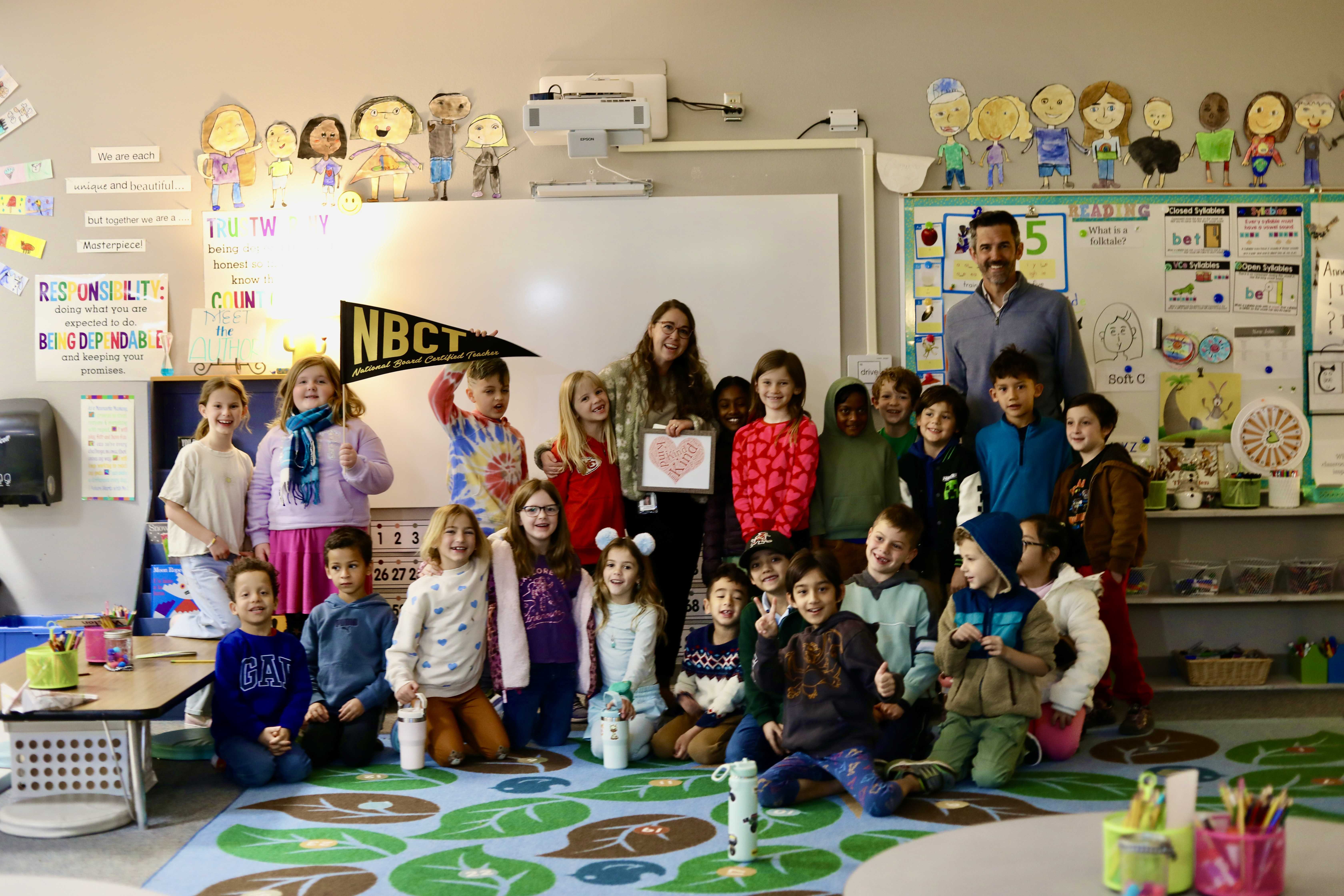 Happy classroom poses with NBCT teacher