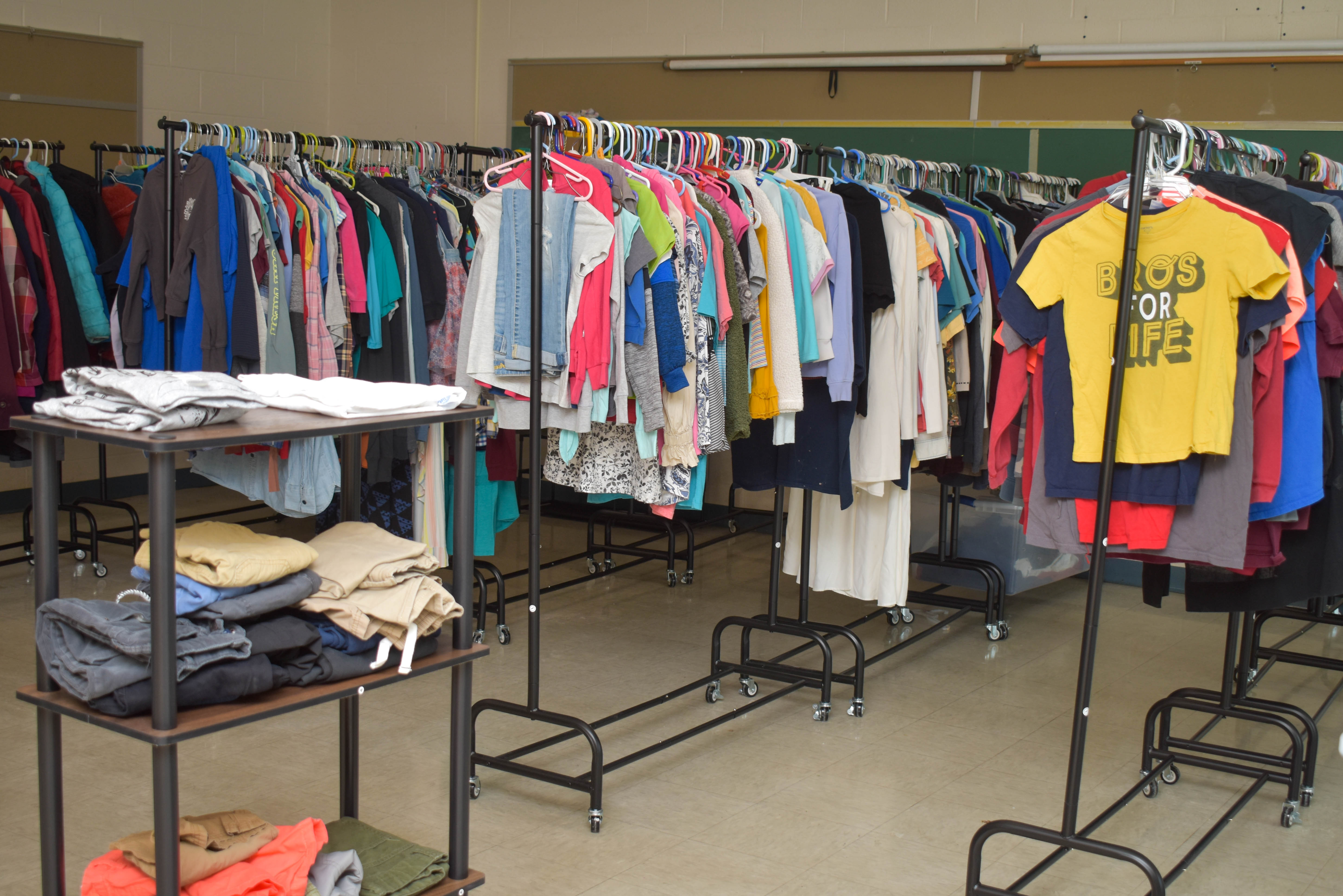 clothing hanging on racks 