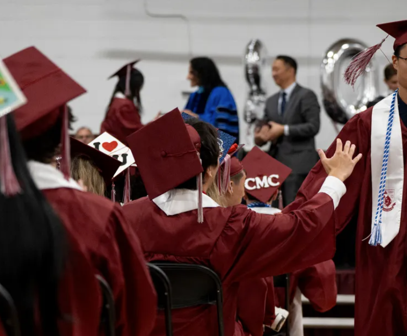 Student walking at graduation