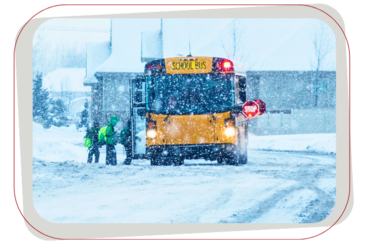 A yellow school bus sits in a snowy scene, with students and adults nearby.