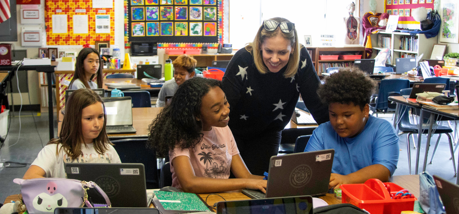 Teacher in class with students