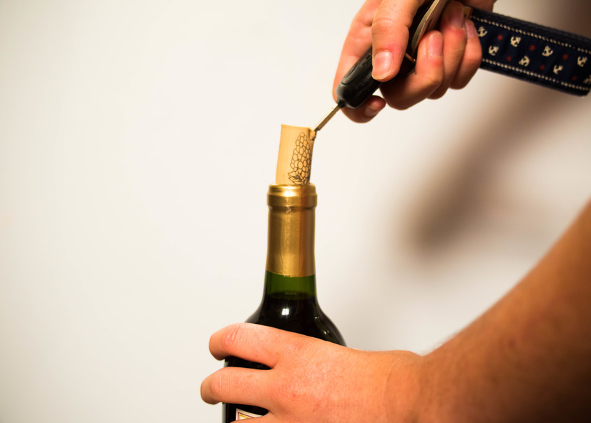 7 Genius Ways to Open a Wine Bottle Without a Corkscrew