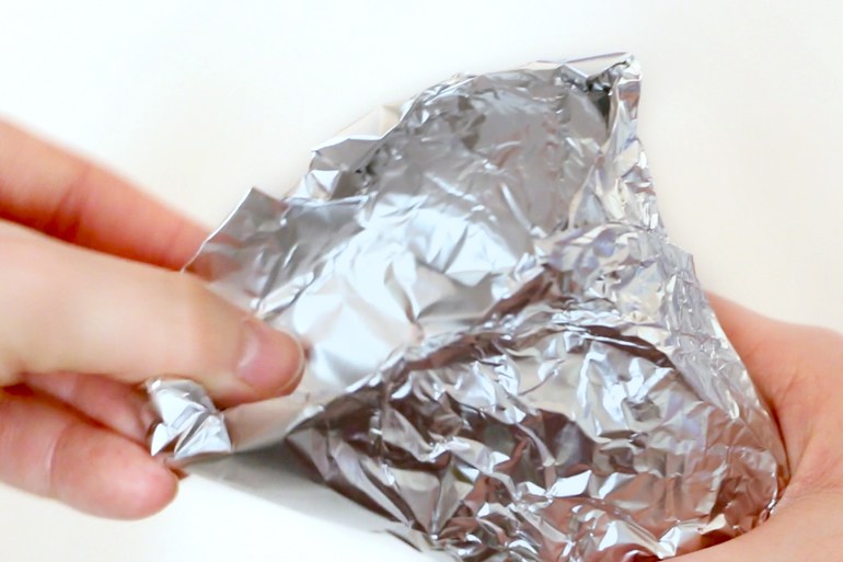 DIY This Makeshift Funnel Using Tin Foil