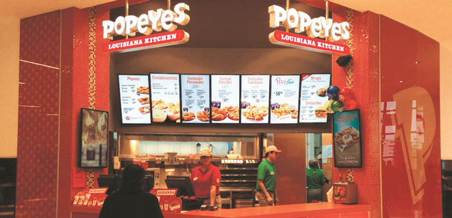 Empresa dueña de Burger King acordó comprar Popeyes por US$1,800 millones