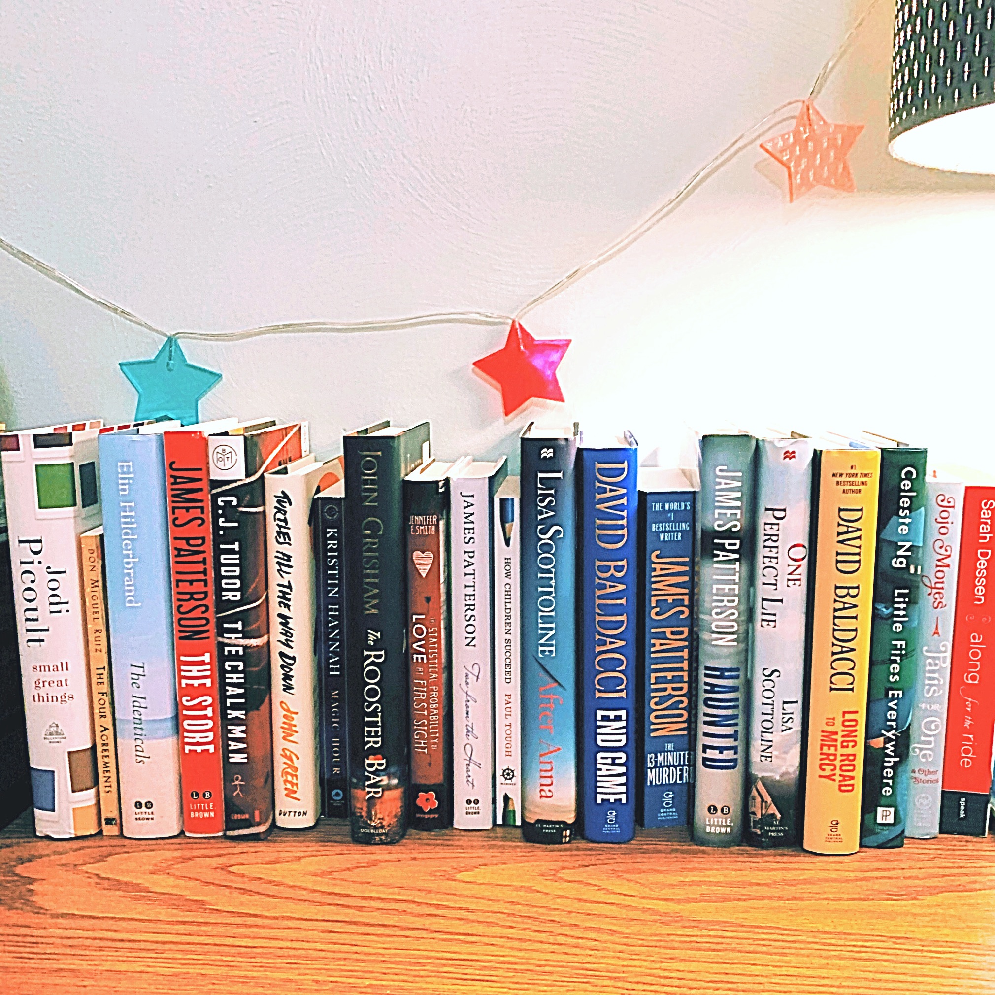 Books spilling out of a beach bag.