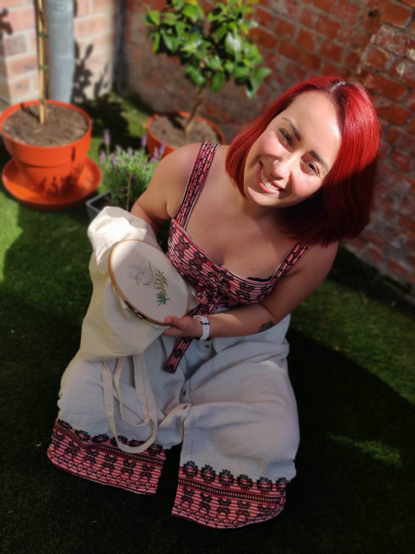 Image of Sandra embroidering