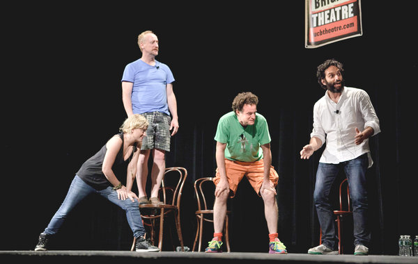 Four improvisers on stage