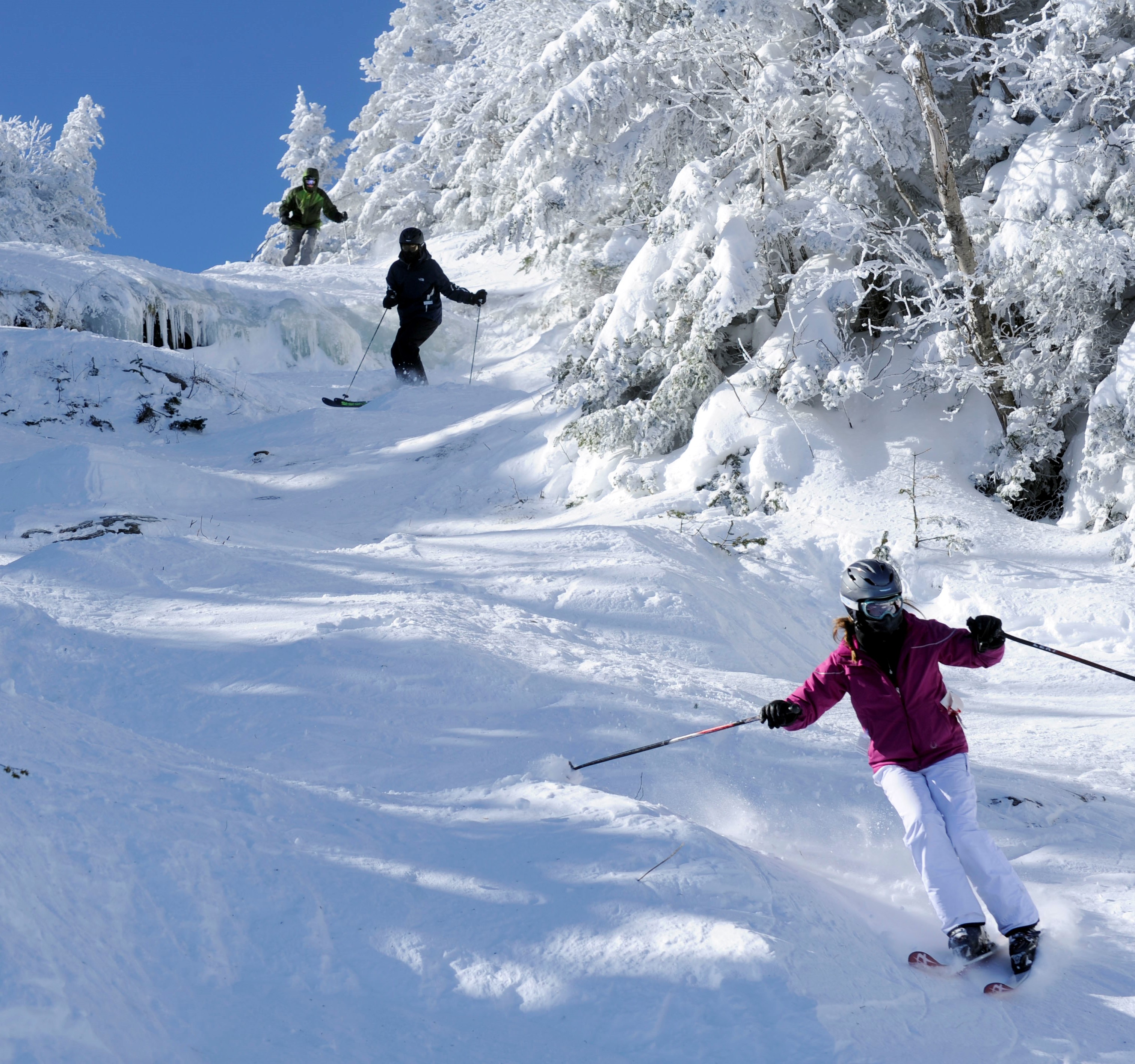 Skiing down a steep slope