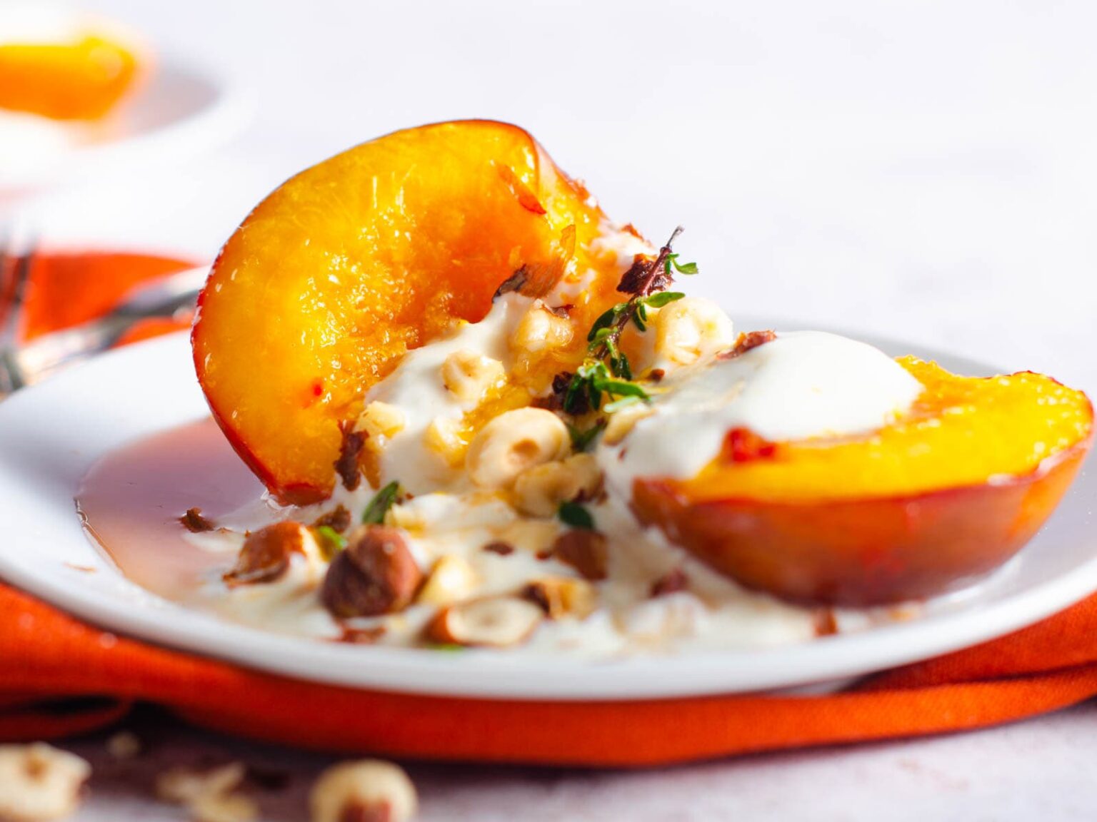 Baked nectarines with hazelnuts and greek yogurt