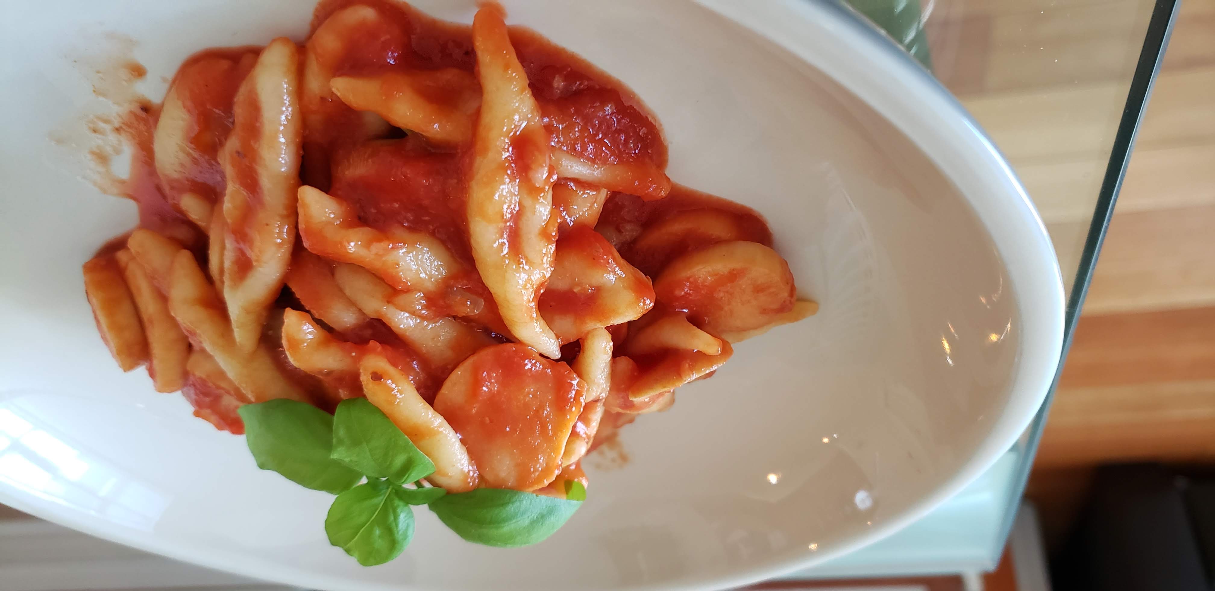 Homemade capunti with arrabiata sauce