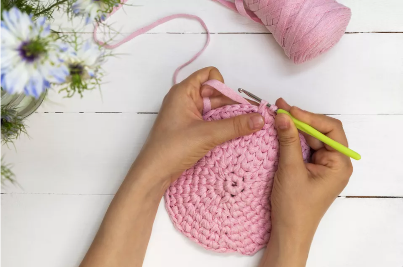 Person Crocheting
