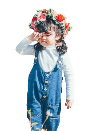 girl in blue overalls wearing a flower crown