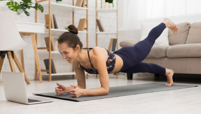 woman doing exercise at home
