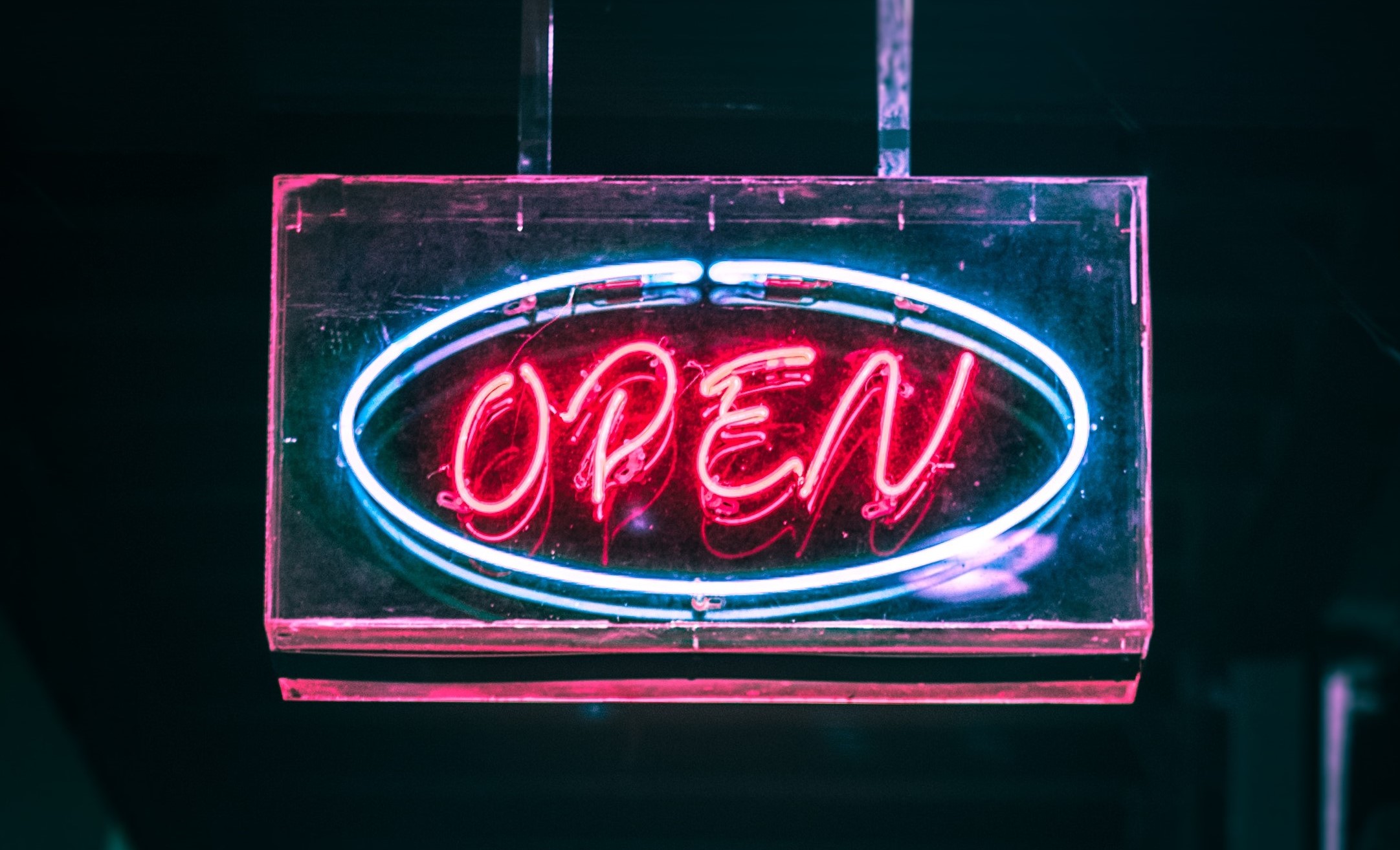 Neon sign that says Open