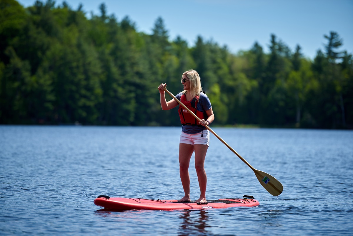 woman paddleboarding