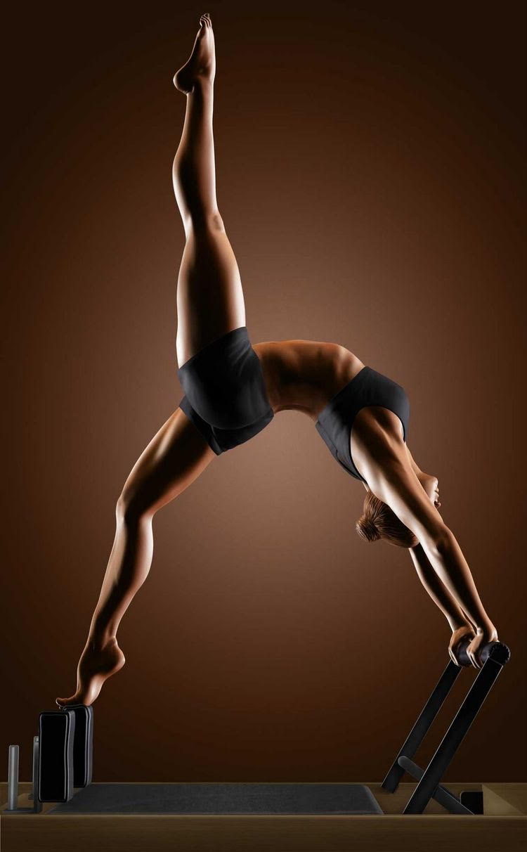 women playing Pilates