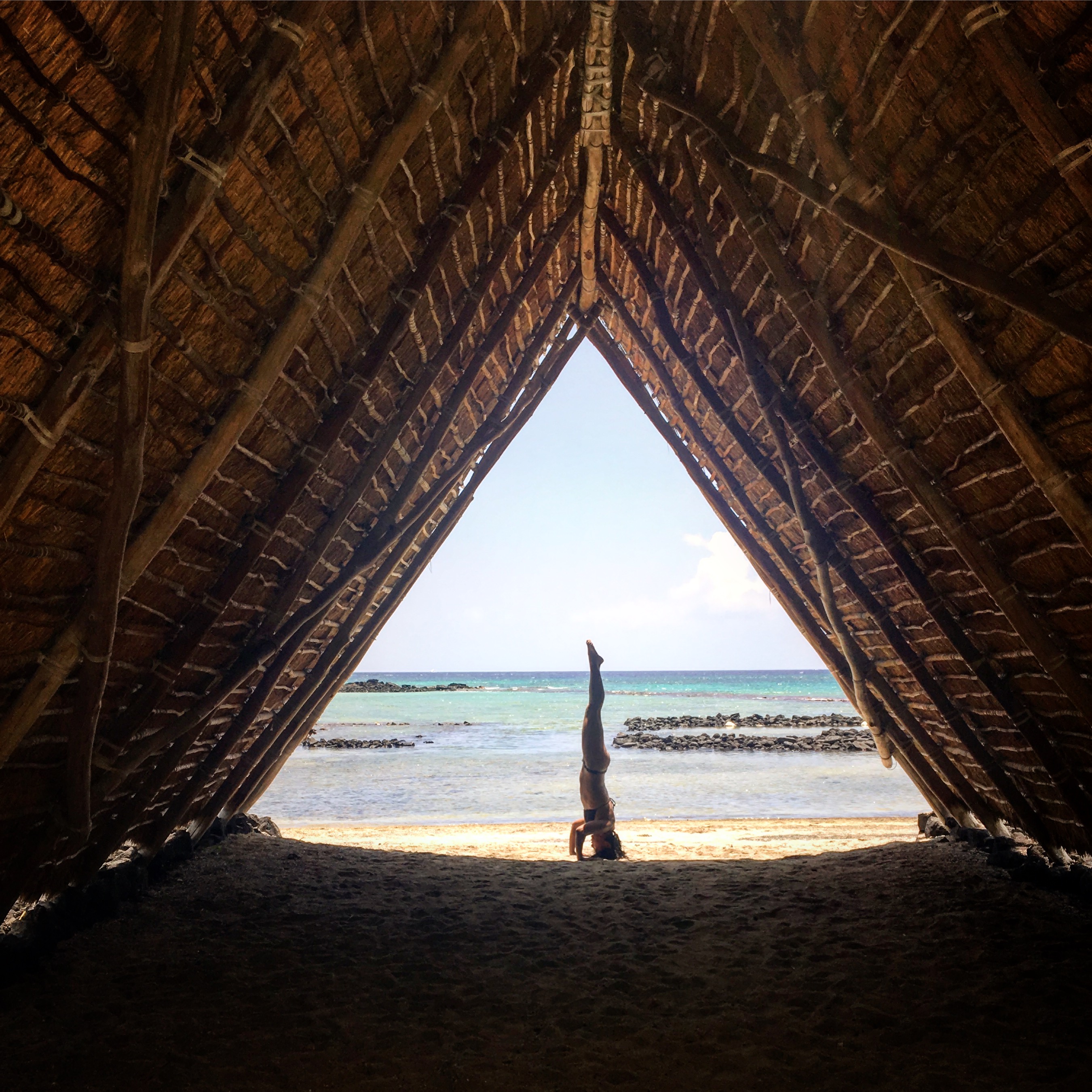 headstand at the beach