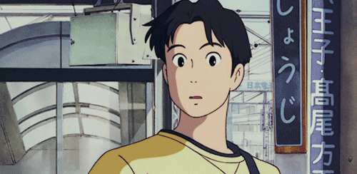 Man looking surprised while staring at woman