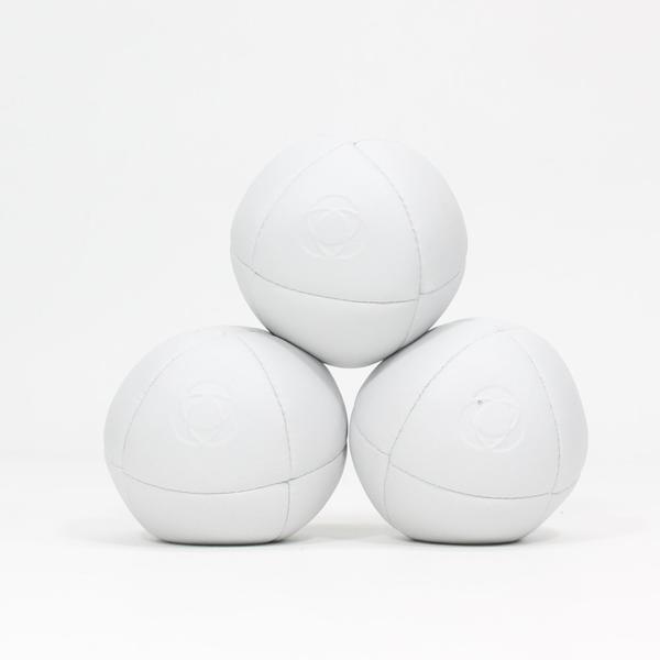 Three juggling balls stacked in a pyramid.