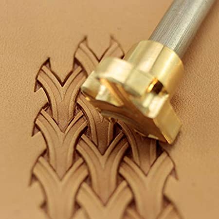 metal tool used to stamp pattern on leather